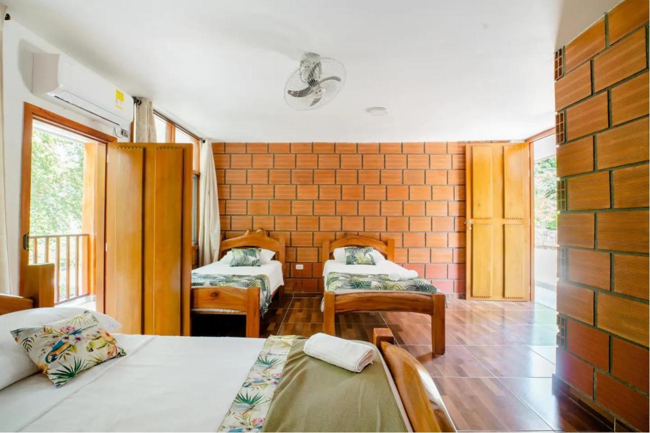 Arca Tayrona Restaurant & Hostal Los Naranjos Bagian luar foto