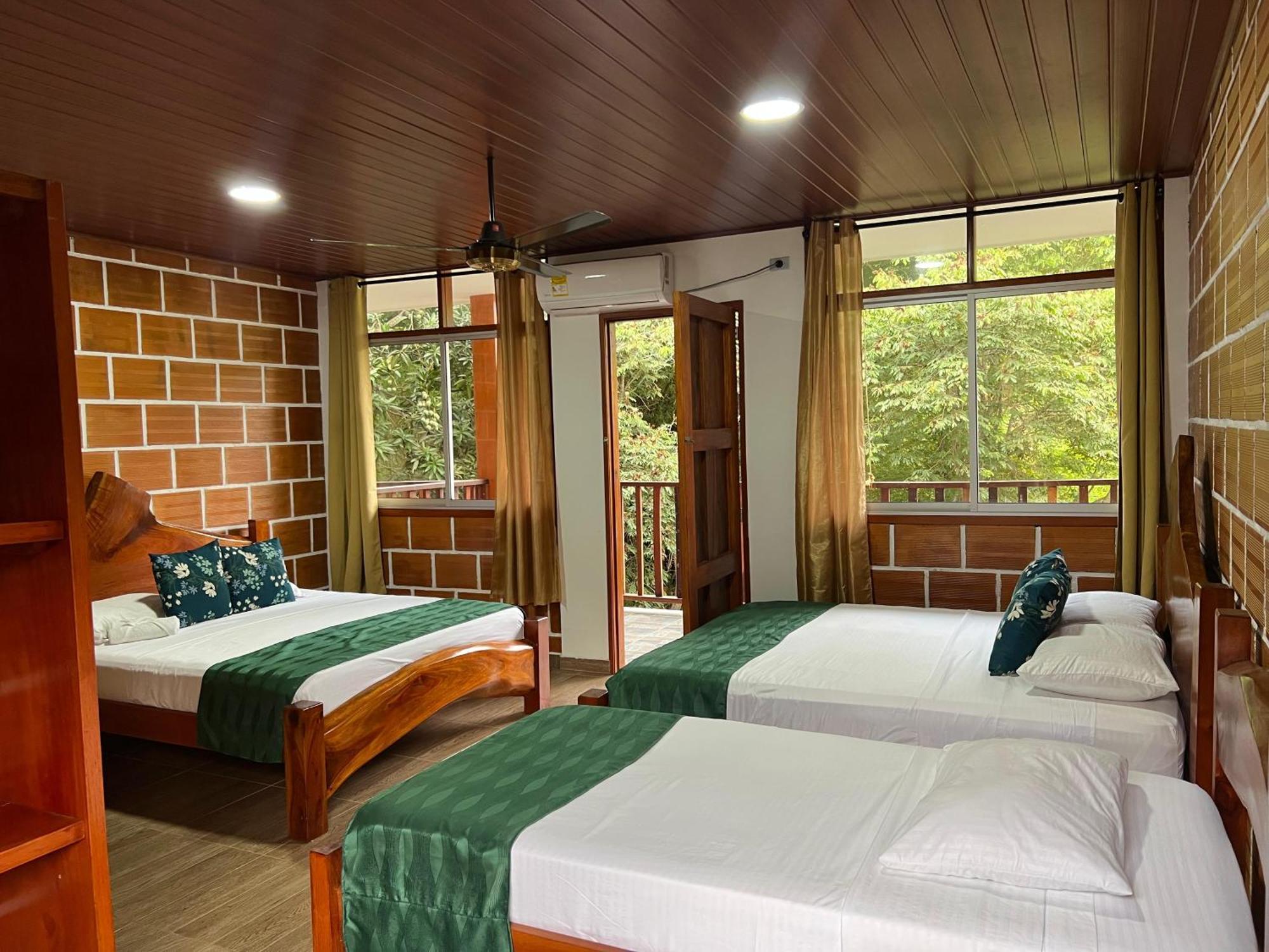 Arca Tayrona Restaurant & Hostal Los Naranjos Bagian luar foto