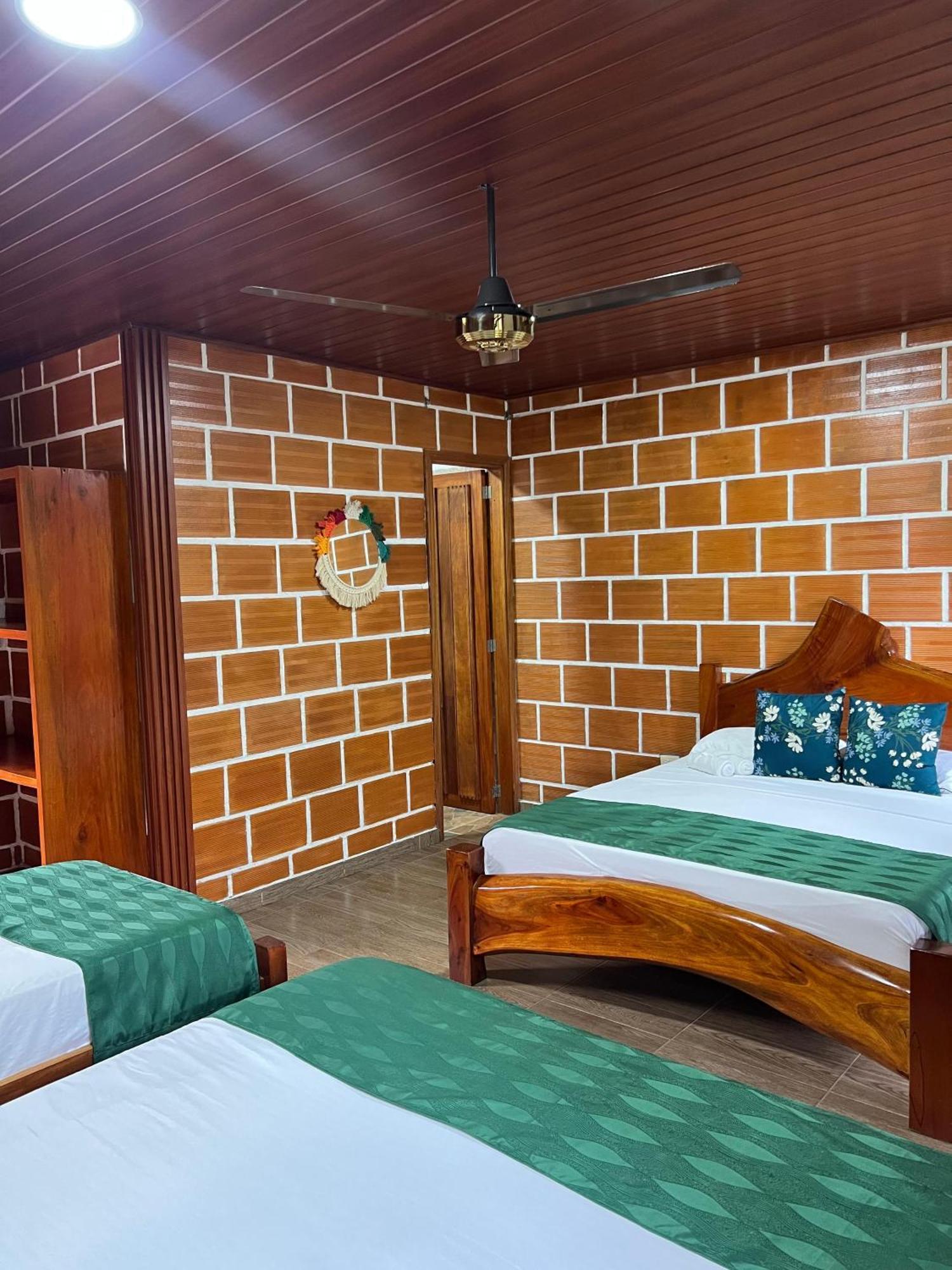 Arca Tayrona Restaurant & Hostal Los Naranjos Bagian luar foto